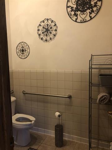5918 Park Ridge Rd, Loves Park, IL 61111 - bathroom with tile walls, tile patterned floors, and wainscoting