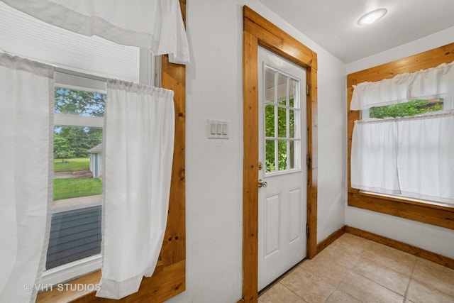2S234 Harter Rd, Elburn, IL 60119 - entryway featuring baseboards and light tile patterned flooring