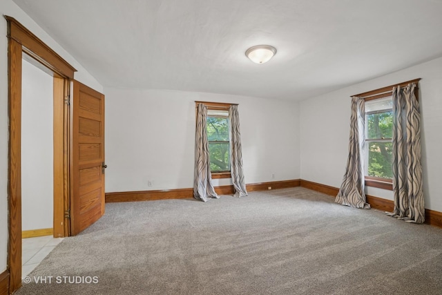 2S234 Harter Rd, Elburn, IL 60119 - spare room with healthy amount of natural light and light colored carpet