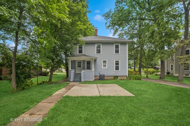 2S234 Harter Rd, Elburn, IL 60119 - rear view of property with a yard, a chimney, and a patio area