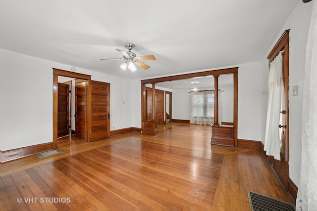 2S234 Harter Rd, Elburn, IL 60119 - unfurnished living room featuring a ceiling fan and hardwood / wood-style flooring