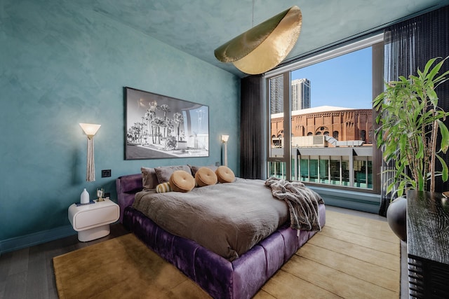 1550 N Clark St Unit 302, Chicago, IL 60610 - bedroom with wood finished floors and baseboards