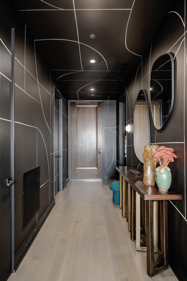 1550 N Clark St Unit 302, Chicago, IL 60610 - corridor featuring wood finished floors and recessed lighting