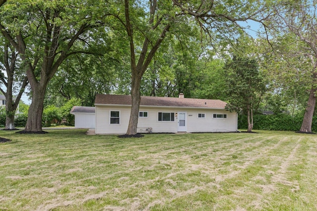 16050 Homan Ave, Markham, IL 60428 - back of house with a lawn