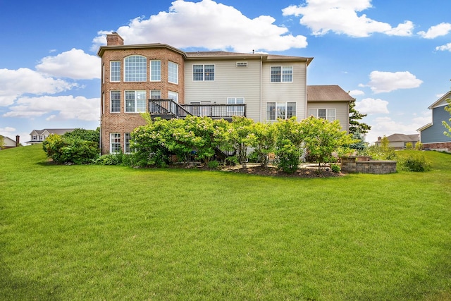 40 Open Pkwy N, Hawthorn Woods, IL 60047 - back of house featuring a lawn and a chimney