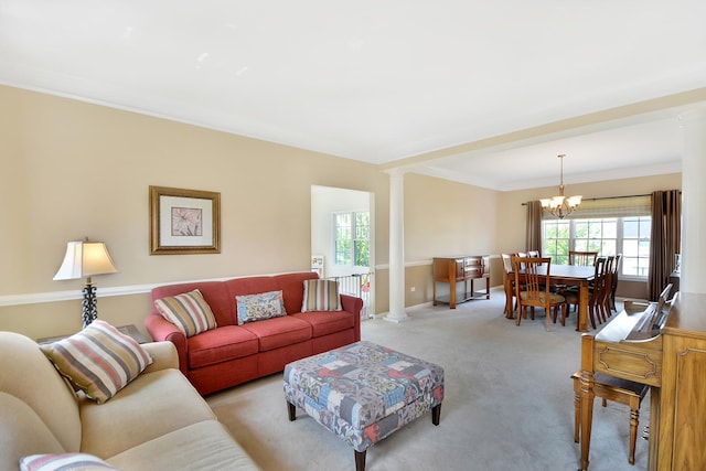 40 Open Pkwy N, Hawthorn Woods, IL 60047 - living area with ornate columns, a chandelier, light colored carpet, and crown molding