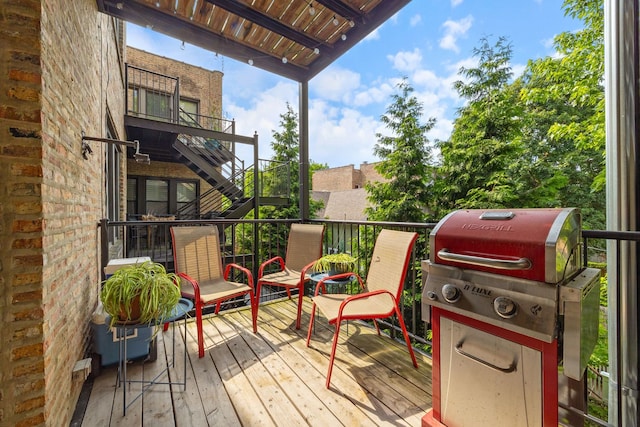 2950 W Cortland St Unit 2, Chicago, IL 60647 - wooden deck featuring area for grilling and stairs