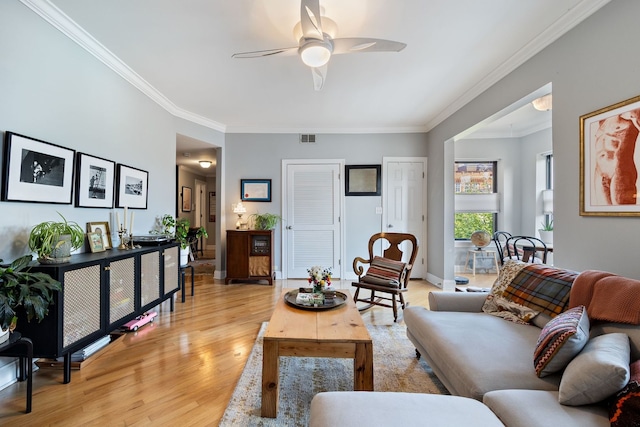 2950 W Cortland St Unit 2, Chicago, IL 60647 - living area featuring a ceiling fan, light wood-type flooring, and crown molding