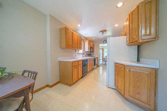 3009 N 78th Ct, Elmwood Park, IL 60707 - kitchen featuring black appliances, light countertops, recessed lighting, and brown cabinets