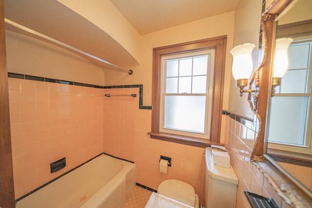 3009 N 78th Ct, Elmwood Park, IL 60707 - full bath with bathtub / shower combination, tile walls, tile patterned floors, and a wainscoted wall