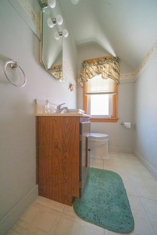 3009 N 78th Ct, Elmwood Park, IL 60707 - bathroom featuring vaulted ceiling and vanity