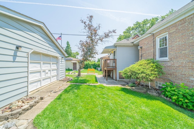 3009 N 78th Ct, Elmwood Park, IL 60707 - view of green lawn with a garage and a deck