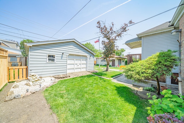 3009 N 78th Ct, Elmwood Park, IL 60707 - view of yard with a garage, an outbuilding, and driveway