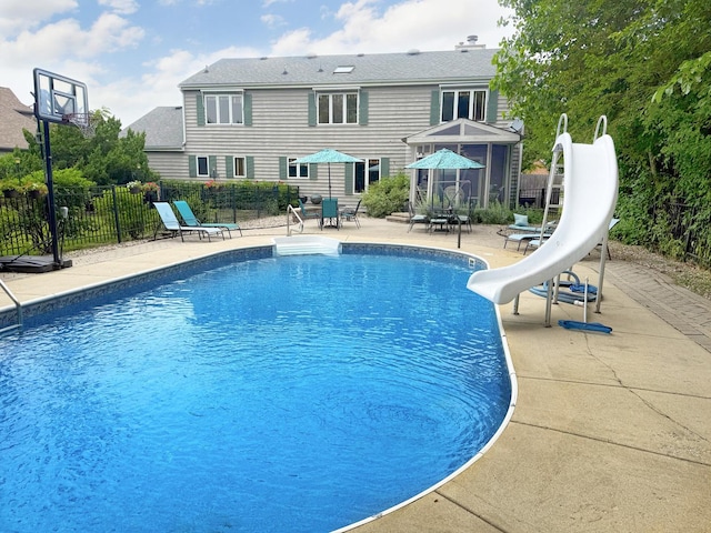 731 Queens Gate Cir, Sugar Grove, IL 60554 - view of pool with a water slide, a patio area, and outdoor dining space