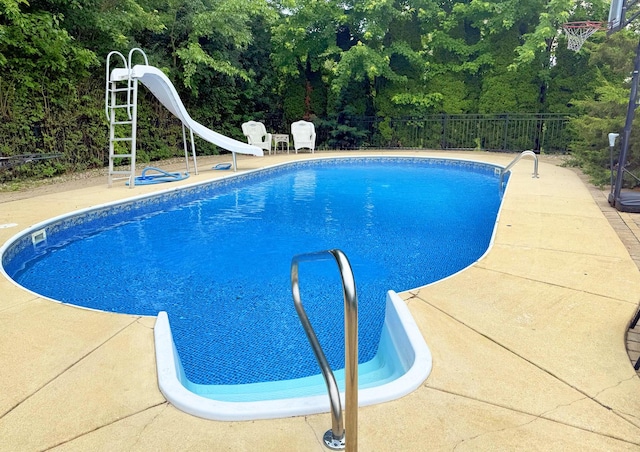 731 Queens Gate Cir, Sugar Grove, IL 60554 - view of pool with a water slide and a view of trees