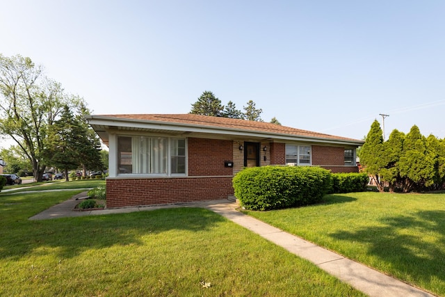 7356 N Nora Ave, Niles, IL 60714 - view of front of property with brick siding and a front lawn