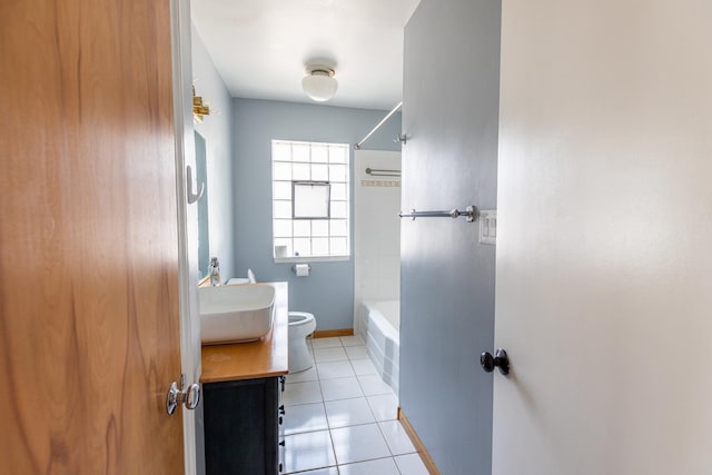 7356 N Nora Ave, Niles, IL 60714 - bathroom featuring vanity, tile patterned flooring, and washtub / shower combination