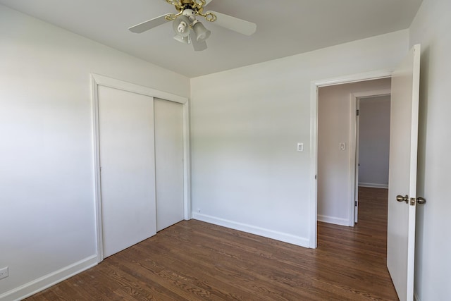 7356 N Nora Ave, Niles, IL 60714 - unfurnished bedroom with dark wood-style floors, a closet, and ceiling fan