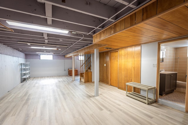 7356 N Nora Ave, Niles, IL 60714 - below grade area with light wood-style flooring and stairway