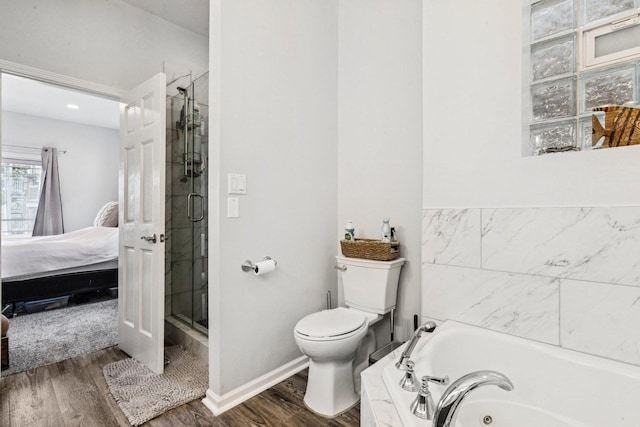 3041 N California Ave Unit 1, Chicago, IL 60618 - full bath featuring ensuite bath, a stall shower, a tub with jets, and wood finished floors