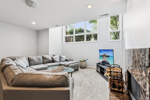 3041 N California Ave Unit 1, Chicago, IL 60618 - living room featuring dark colored carpet, a fireplace, plenty of natural light, and recessed lighting
