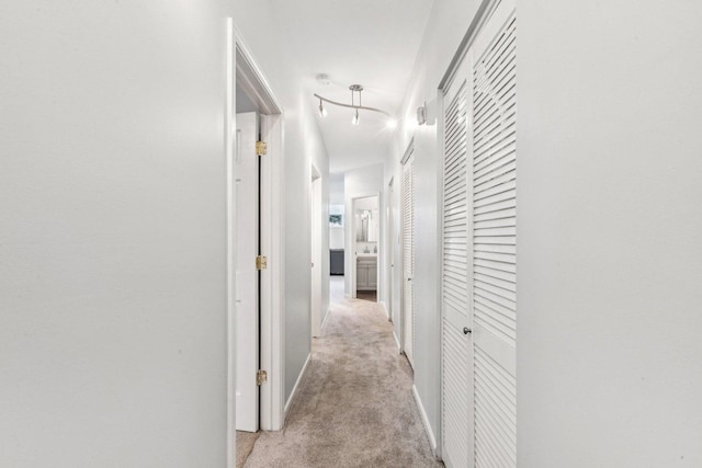 3041 N California Ave Unit 1, Chicago, IL 60618 - corridor featuring light colored carpet and baseboards