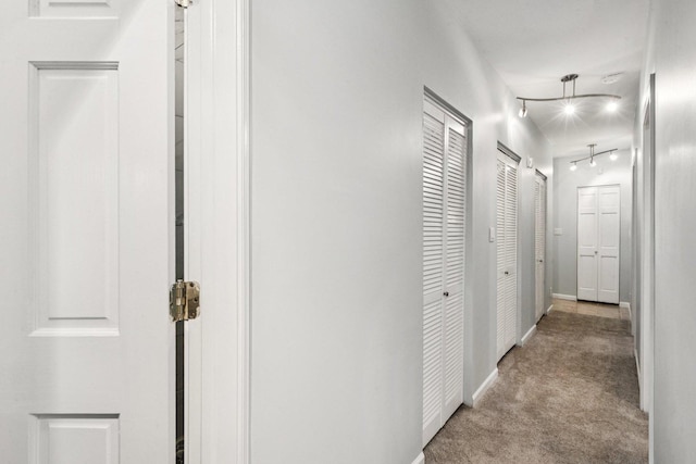 3041 N California Ave Unit 1, Chicago, IL 60618 - hall with carpet floors and track lighting