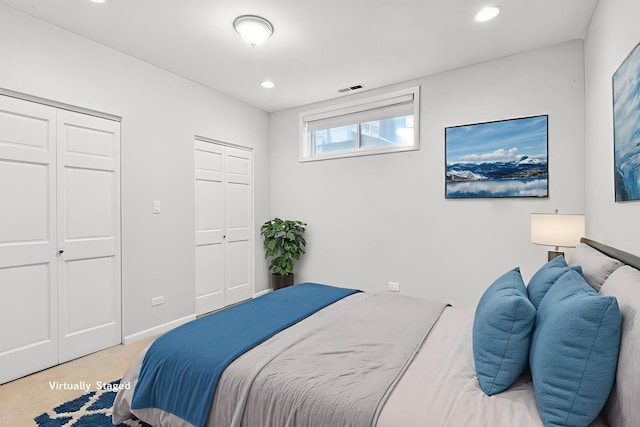 3041 N California Ave Unit 1, Chicago, IL 60618 - bedroom with multiple closets and recessed lighting