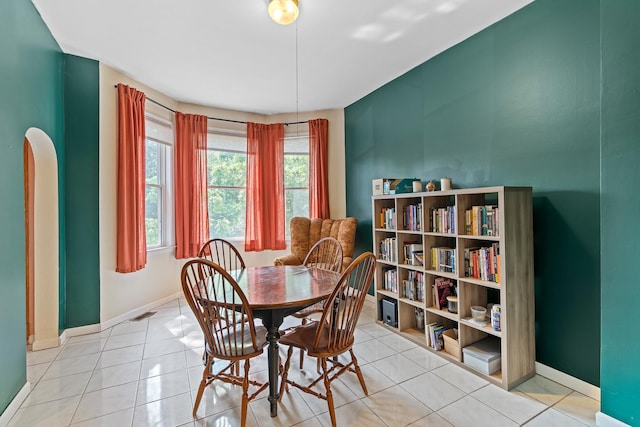 3609 S Leavitt St, Chicago, IL 60609 - dining area featuring baseboards and tile patterned floors
