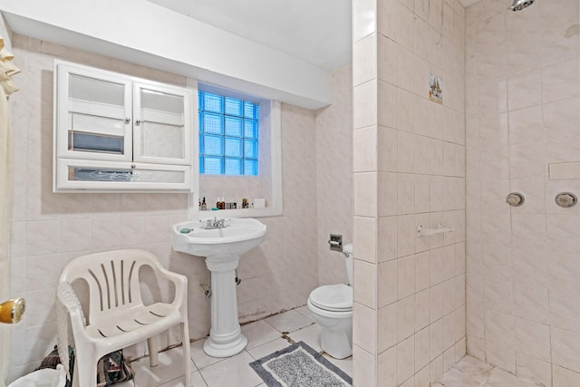 3609 S Leavitt St, Chicago, IL 60609 - bathroom with tiled shower, tile walls, and tile patterned floors