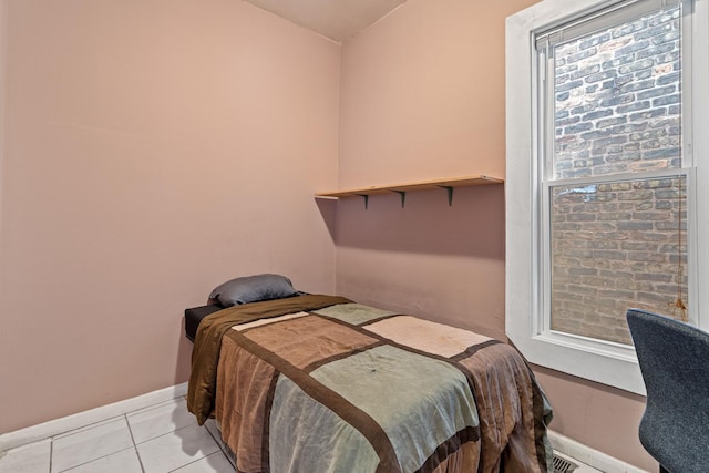 3609 S Leavitt St, Chicago, IL 60609 - bedroom with light tile patterned floors and baseboards