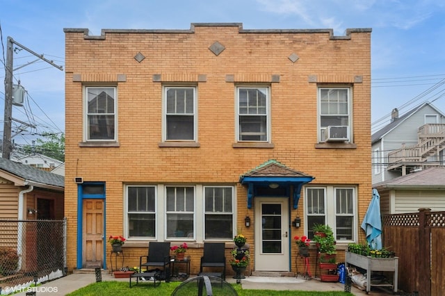 1328 W Nelson St, Chicago, IL 60657 - view of front facade with cooling unit and brick siding