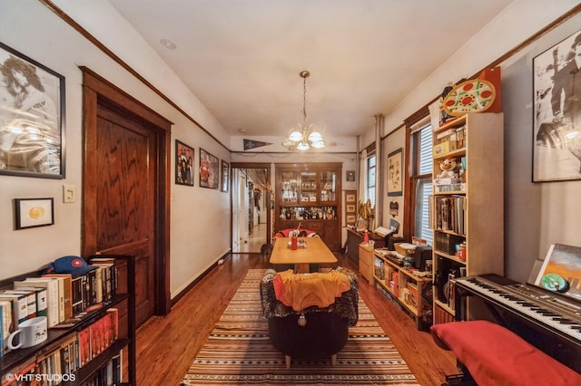 1328 W Nelson St, Chicago, IL 60657 - dining area with a chandelier and wood finished floors