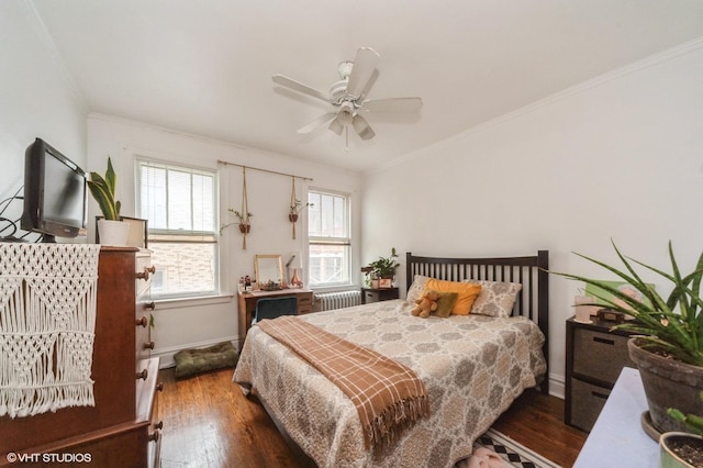 1328 W Nelson St, Chicago, IL 60657 - bedroom featuring radiator heating unit, wood finished floors, crown molding, and ceiling fan