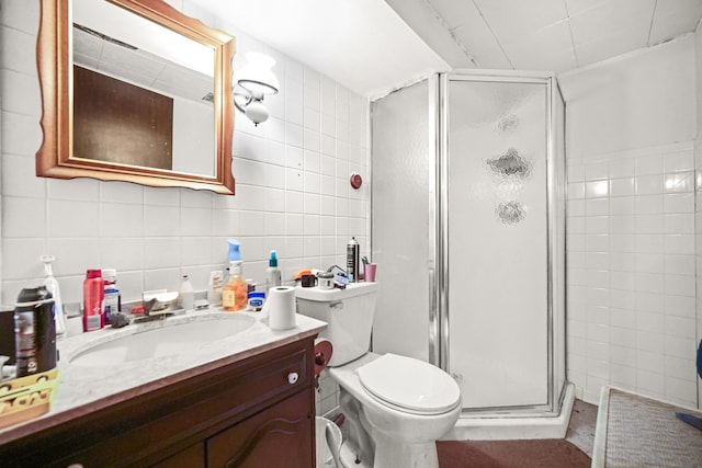 5826 Edward Dr, Oak Forest, IL 60452 - bathroom featuring tile walls, a stall shower, vanity, and decorative backsplash