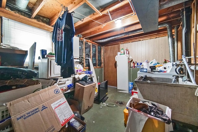 5826 Edward Dr, Oak Forest, IL 60452 - unfinished below grade area featuring washer and dryer