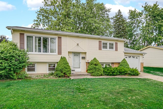 5826 Edward Dr, Oak Forest, IL 60452 - split foyer home featuring a front lawn, driveway, and an attached garage