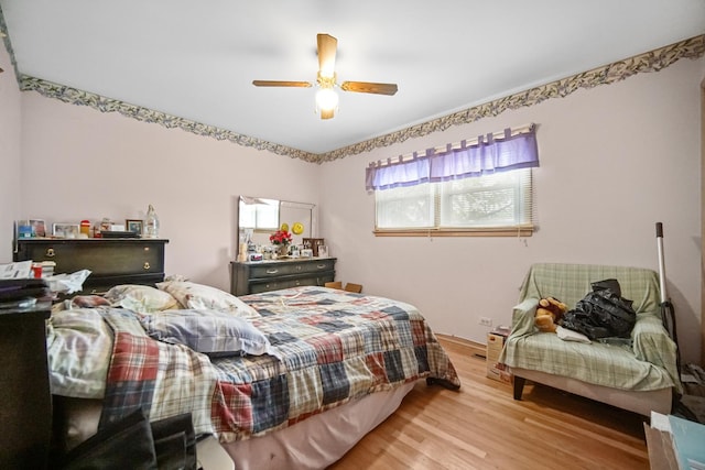 5826 Edward Dr, Oak Forest, IL 60452 - bedroom featuring light wood-type flooring and a ceiling fan