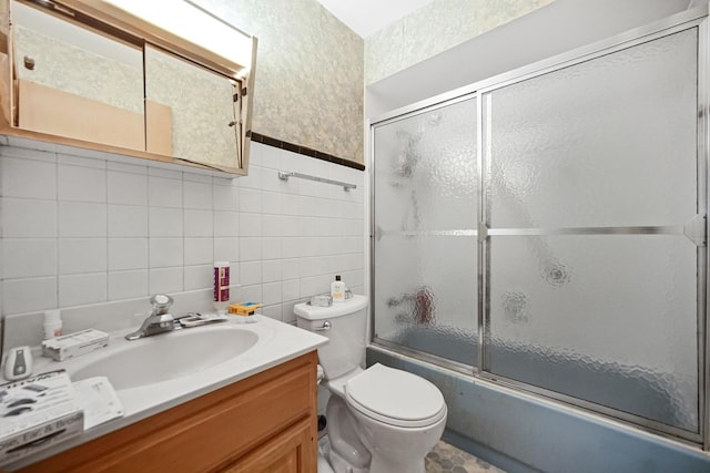 5826 Edward Dr, Oak Forest, IL 60452 - bathroom with bath / shower combo with glass door, tile walls, and vanity