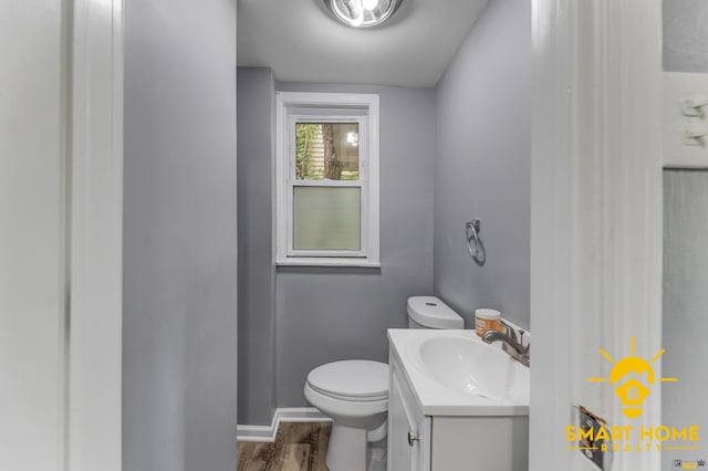 9019 S Justine St, Chicago, IL 60620 - half bathroom with vanity and wood finished floors