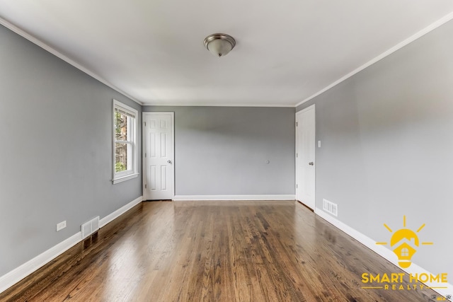 9019 S Justine St, Chicago, IL 60620 - spare room featuring ornamental molding and wood finished floors
