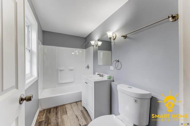 9019 S Justine St, Chicago, IL 60620 - full bath with vanity, wood finished floors, and bathing tub / shower combination