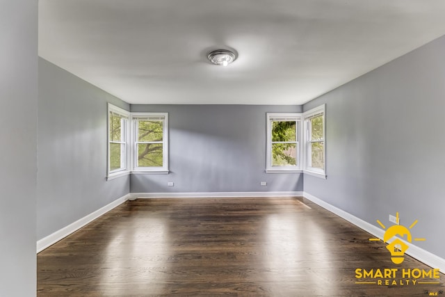 9019 S Justine St, Chicago, IL 60620 - empty room featuring baseboards and wood finished floors