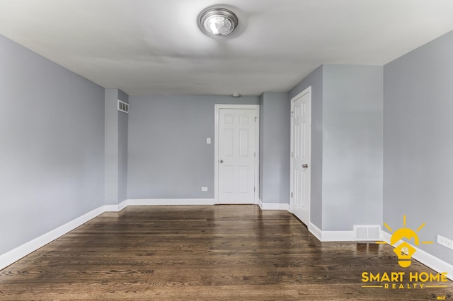 9019 S Justine St, Chicago, IL 60620 - unfurnished room featuring wood finished floors and baseboards
