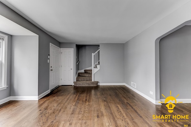 9019 S Justine St, Chicago, IL 60620 - unfurnished living room with wood finished floors and stairway
