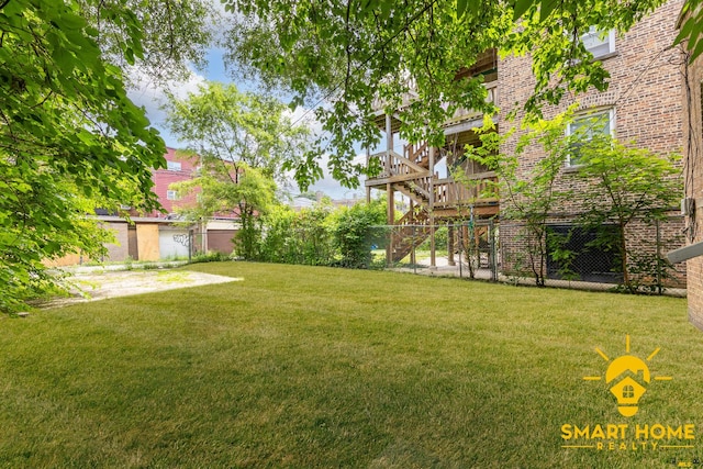 9019 S Justine St, Chicago, IL 60620 - view of yard featuring stairway and a deck
