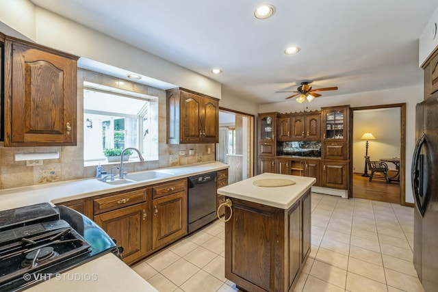 214 S Belmont Ave, Arlington Heights, IL 60005 - kitchen featuring black appliances, backsplash, ceiling fan, a center island, and recessed lighting