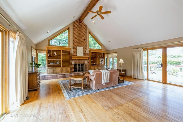 214 S Belmont Ave, Arlington Heights, IL 60005 - living room featuring a ceiling fan, high vaulted ceiling, beamed ceiling, wood finished floors, and a fireplace