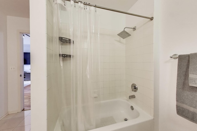 1430 S Michigan Ave Unit 510, Chicago, IL 60605 - bathroom with shower / tub combo with curtain and tile patterned floors