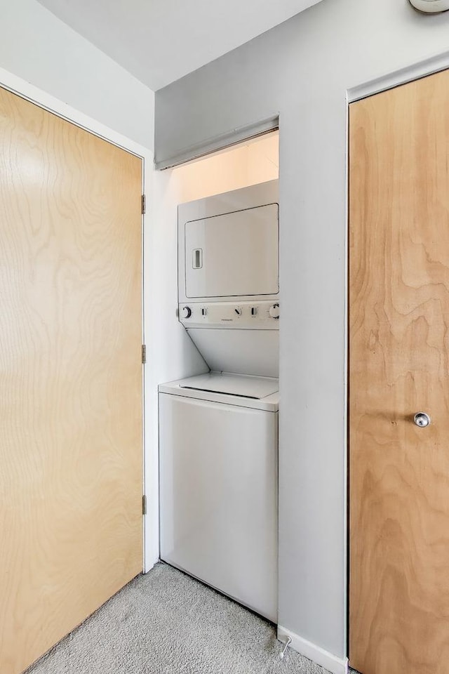 1430 S Michigan Ave Unit 510, Chicago, IL 60605 - laundry room with stacked washer / dryer and light carpet